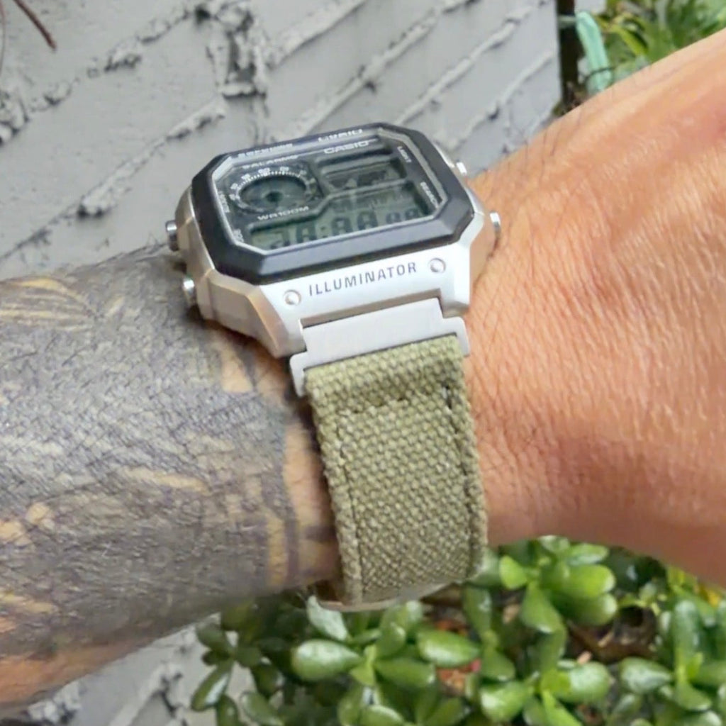 Casio AE-1200WHD Royale with olive canvas strap and brushed silver adapters