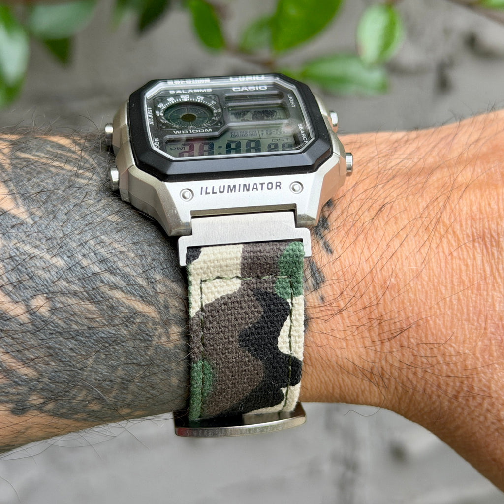 Casio AE-1200WHD Royale with woodland camo canvas strap and brushed silver adapters